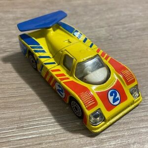 1984 Matchbox Group C Racer #2 Yellow Orange Blue Macau 1:55 Scale Die Cast Toy